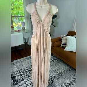Size medium flowy and airy cream colored maxi dress with open back detailing